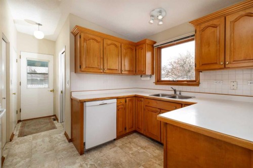20 Macleod Close, Red Deer, AB - Indoor Photo Showing Kitchen With Double Sink