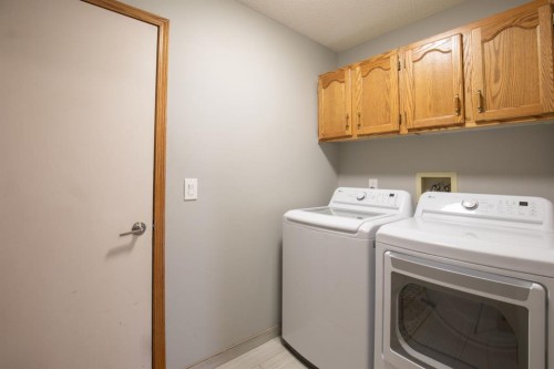 87 Denison Crescent, Red Deer, AB - Indoor Photo Showing Laundry Room