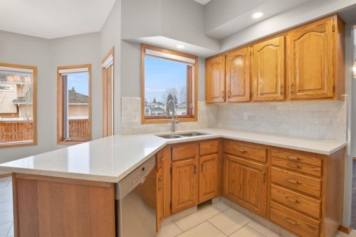 87 Denison Crescent, Red Deer, AB - Indoor Photo Showing Kitchen With Double Sink