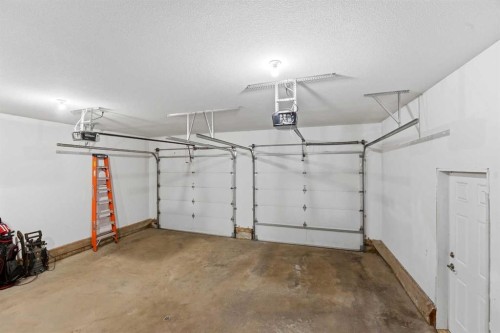 122 Sutherland Close, Red Deer, AB - Indoor Photo Showing Garage