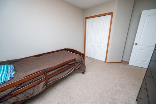 75 Doherty Close, Red Deer, AB - Indoor Photo Showing Bedroom