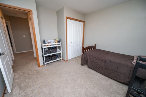 75 Doherty Close, Red Deer, AB - Indoor Photo Showing Bedroom
