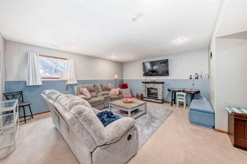 35 Dentoom Close, Red Deer, AB - Indoor Photo Showing Living Room With Fireplace