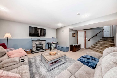 35 Dentoom Close, Red Deer, AB - Indoor Photo Showing Living Room With Fireplace