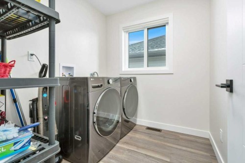 26 Athens Place, Blackfalds, AB - Indoor Photo Showing Laundry Room