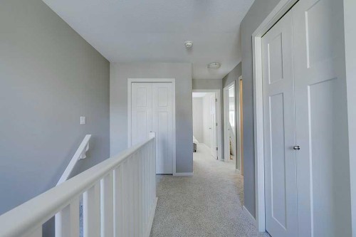 7-5301 Windward Place, Sylvan Lake, AB - Indoor Photo Showing Other Room