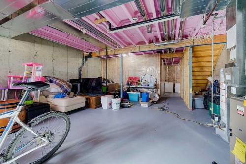 7-5301 Windward Place, Sylvan Lake, AB - Indoor Photo Showing Basement