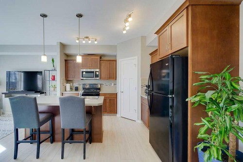 7-5301 Windward Place, Sylvan Lake, AB - Indoor Photo Showing Kitchen