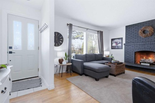 13 Ockley Close, Red Deer, AB - Indoor Photo Showing Living Room With Fireplace