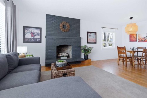 13 Ockley Close, Red Deer, AB - Indoor Photo Showing Living Room With Fireplace