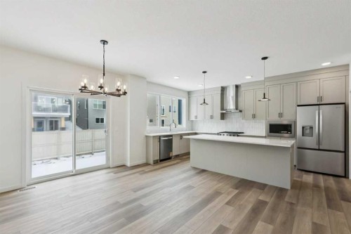 823 Bayview Terrace Sw, Airdrie, AB - Indoor Photo Showing Kitchen With Upgraded Kitchen