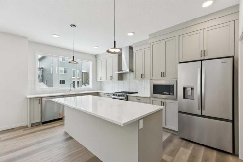 823 Bayview Terrace Sw, Airdrie, AB - Indoor Photo Showing Kitchen With Upgraded Kitchen