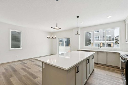 823 Bayview Terrace Sw, Airdrie, AB - Indoor Photo Showing Kitchen With Upgraded Kitchen