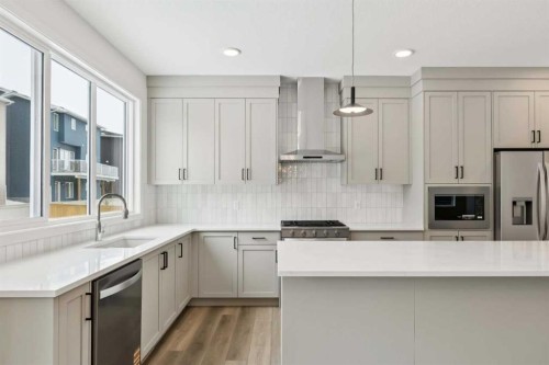 823 Bayview Terrace Sw, Airdrie, AB - Indoor Photo Showing Kitchen With Upgraded Kitchen