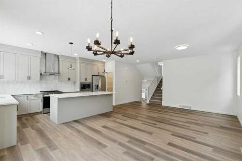 823 Bayview Terrace Sw, Airdrie, AB - Indoor Photo Showing Kitchen With Upgraded Kitchen