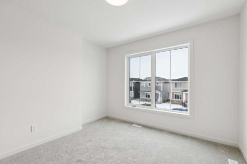 823 Bayview Terrace Sw, Airdrie, AB - Indoor Photo Showing Other Room