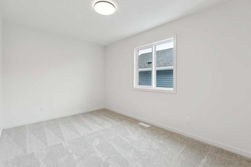 823 Bayview Terrace Sw, Airdrie, AB - Indoor Photo Showing Other Room