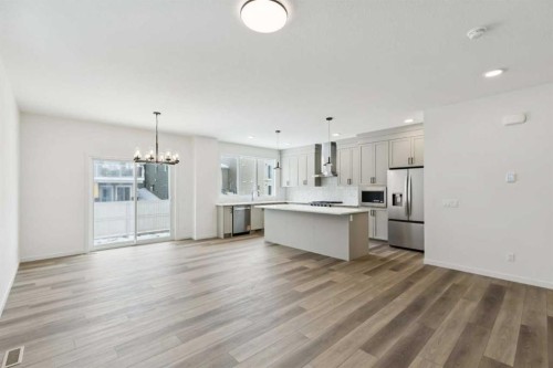 823 Bayview Terrace Sw, Airdrie, AB - Indoor Photo Showing Kitchen With Upgraded Kitchen