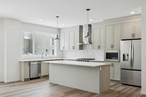 823 Bayview Terrace Sw, Airdrie, AB - Indoor Photo Showing Kitchen With Upgraded Kitchen