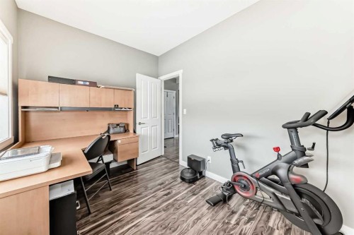 3 Hanson Green, Penhold, AB - Indoor Photo Showing Gym Room