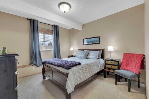8 Laurel Close, Sylvan Lake, AB - Indoor Photo Showing Bedroom