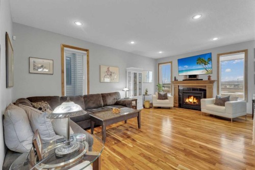 8 Laurel Close, Sylvan Lake, AB - Indoor Photo Showing Living Room With Fireplace