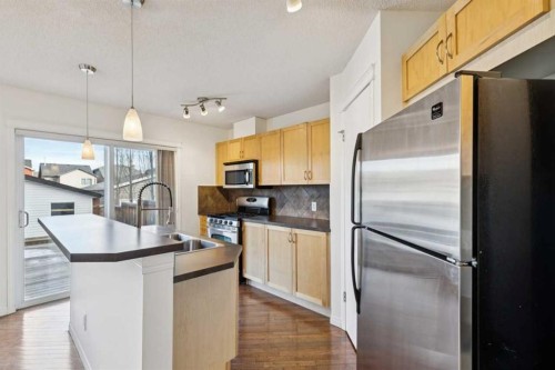 99 Auburn Bay Manor Se, Calgary, AB - Indoor Photo Showing Kitchen With Stainless Steel Kitchen