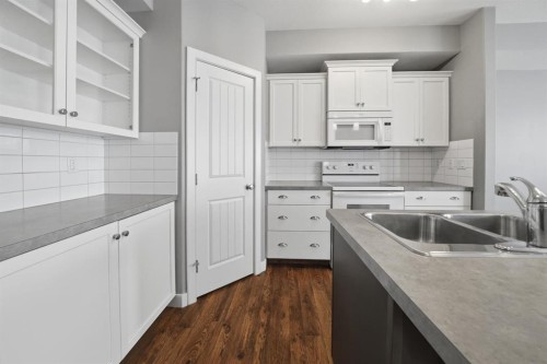 15 Tallman Close, Red Deer, AB - Indoor Photo Showing Kitchen With Double Sink