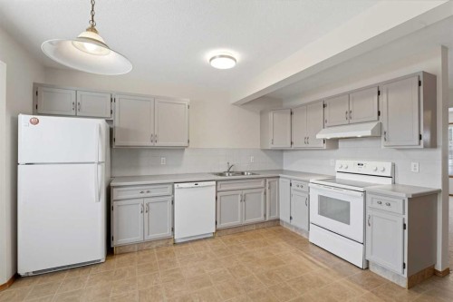 2 Davis Close, Red Deer, AB - Indoor Photo Showing Kitchen With Double Sink