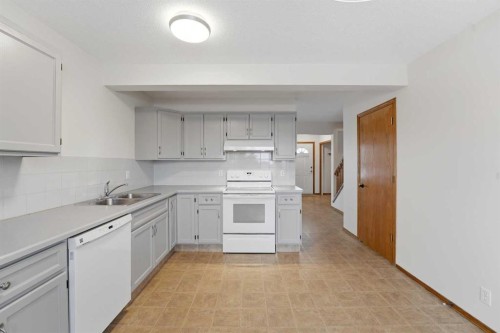 2 Davis Close, Red Deer, AB - Indoor Photo Showing Kitchen With Double Sink