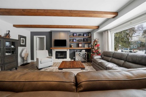 3722 44 Avenue, Red Deer, AB - Indoor Photo Showing Living Room With Fireplace