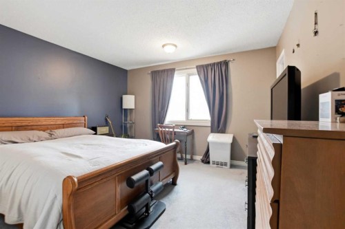 39 Norris Close, Red Deer, AB - Indoor Photo Showing Bedroom