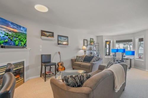 37-33 Donlevy Avenue, Red Deer, AB - Indoor Photo Showing Living Room With Fireplace