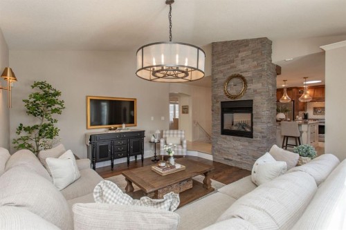 21 Dandell Close, Red Deer, AB - Indoor Photo Showing Living Room With Fireplace