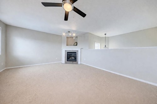 11 Inglis Crescent, Red Deer, AB - Indoor With Fireplace