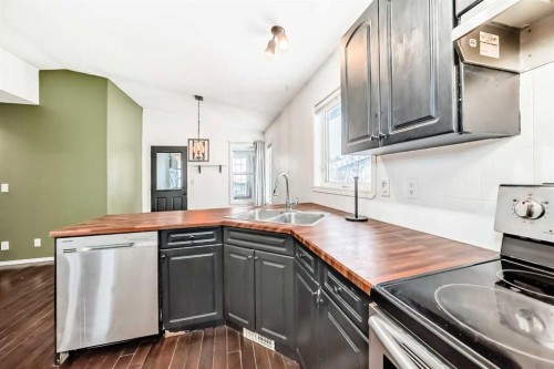 29 Duval Crescent, Red Deer, AB - Indoor Photo Showing Kitchen With Double Sink