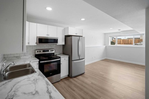 7403 44 Avenue, Camrose, AB - Indoor Photo Showing Kitchen With Double Sink