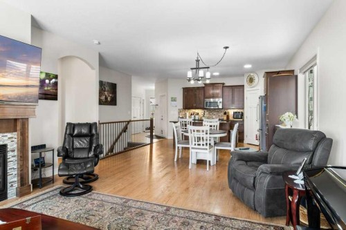 4916 Beardsley Avenue, Lacombe, AB - Indoor Photo Showing Living Room With Fireplace