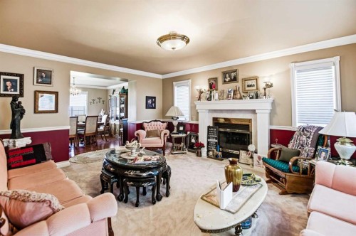 3000 35 Street, Ponoka, AB - Indoor Photo Showing Living Room With Fireplace