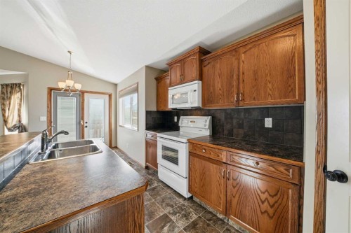 9 Thomas Place, Red Deer, AB - Indoor Photo Showing Kitchen With Double Sink
