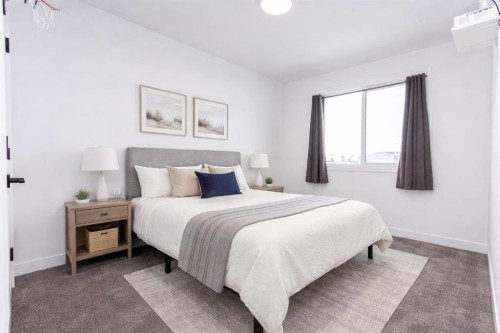 66 Henderson Crescent, Penhold, AB - Indoor Photo Showing Bedroom