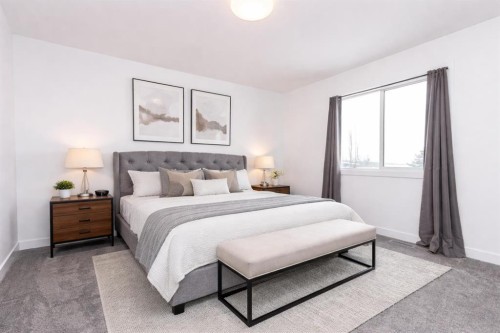 66 Henderson Crescent, Penhold, AB - Indoor Photo Showing Bedroom