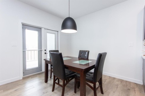 66 Henderson Crescent, Penhold, AB - Indoor Photo Showing Dining Room