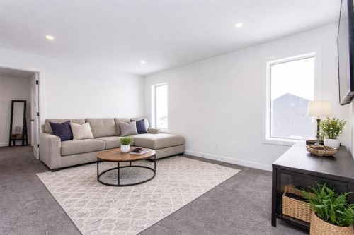66 Henderson Crescent, Penhold, AB - Indoor Photo Showing Living Room