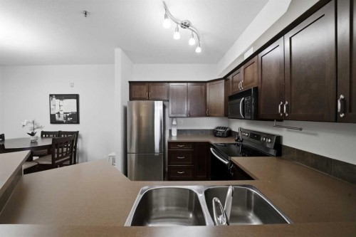 315-69 Ironstone, Red Deer, AB - Indoor Photo Showing Kitchen With Double Sink