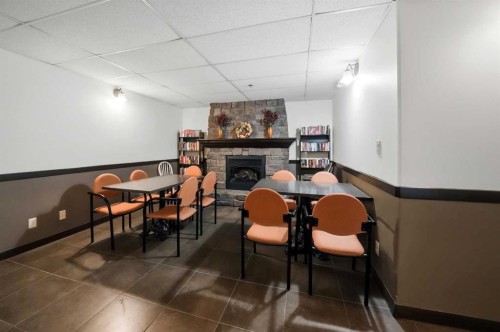 315-69 Ironstone, Red Deer, AB - Indoor With Fireplace