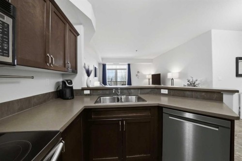 315-69 Ironstone, Red Deer, AB - Indoor Photo Showing Kitchen With Double Sink