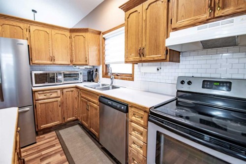 22 Doan Avenue, Red Deer, AB - Indoor Photo Showing Kitchen With Double Sink