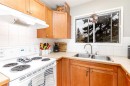6343 58 Ave Avenue West, Red Deer, AB  - Indoor Photo Showing Kitchen With Double Sink 