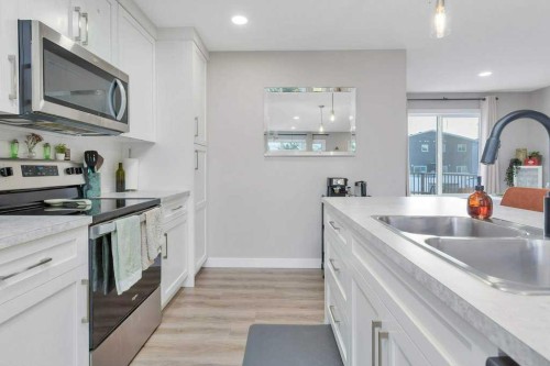 49 Evergreen Way, Red Deer, AB - Indoor Photo Showing Kitchen With Double Sink